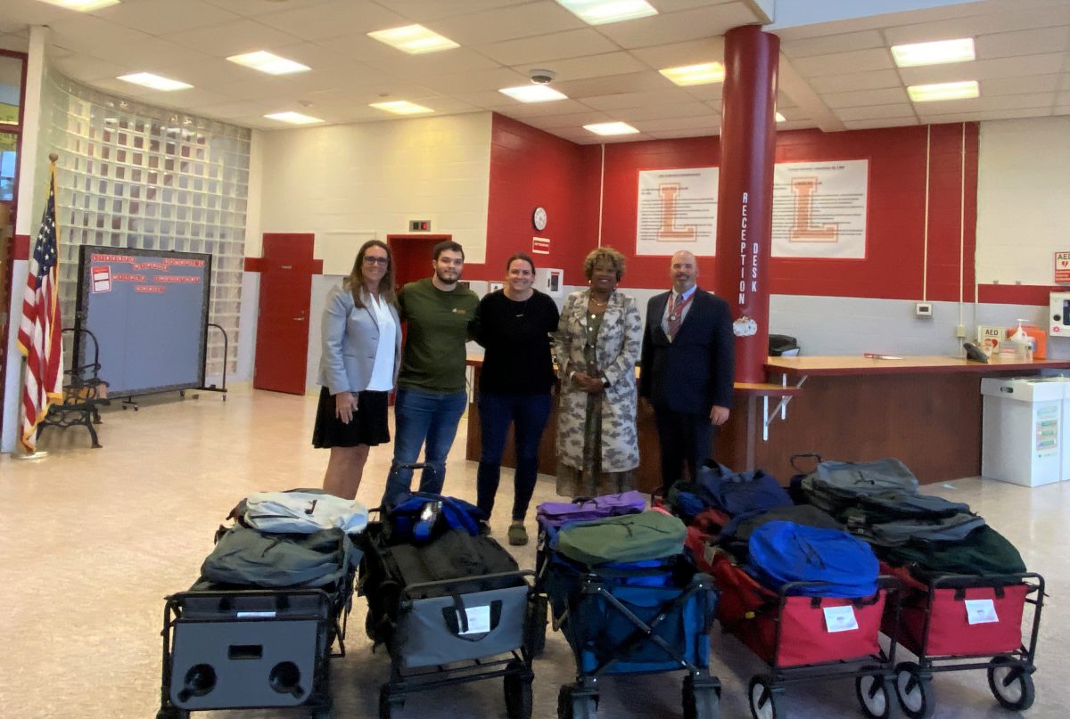 ATI donates 100 backpacks to Liberty