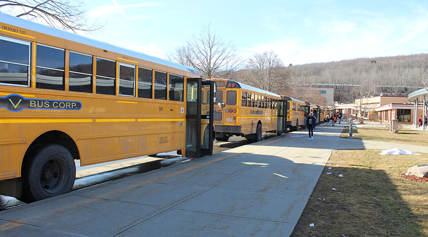 Buses line up outside the Liberty Middle and High School