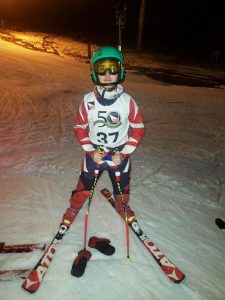 A skier poses for a photo.