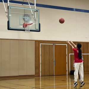 A student shoots a freethrow