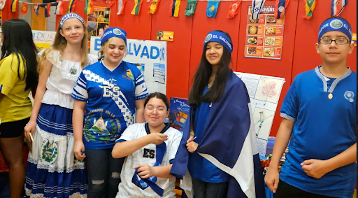 Students pose for a photo during cross cultural day