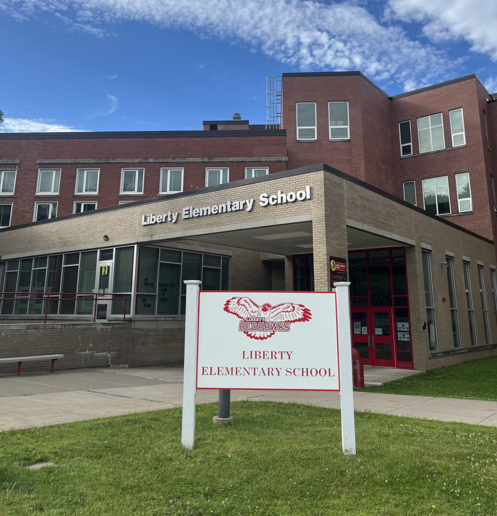 The Liberty Elementary School building main entrance and sign