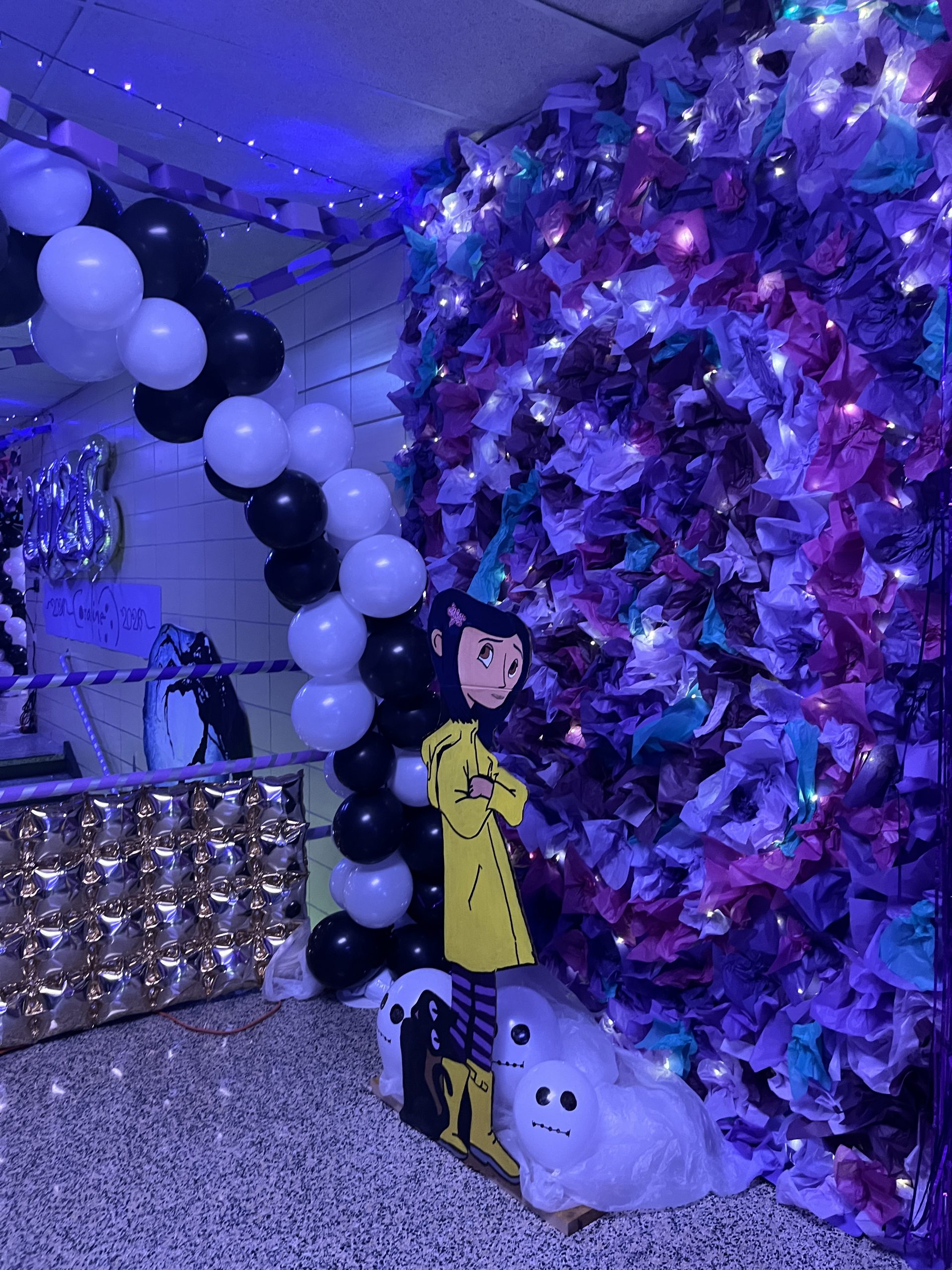 class of 2026-hallway-scene A niche is decorated in a Coraline theme.