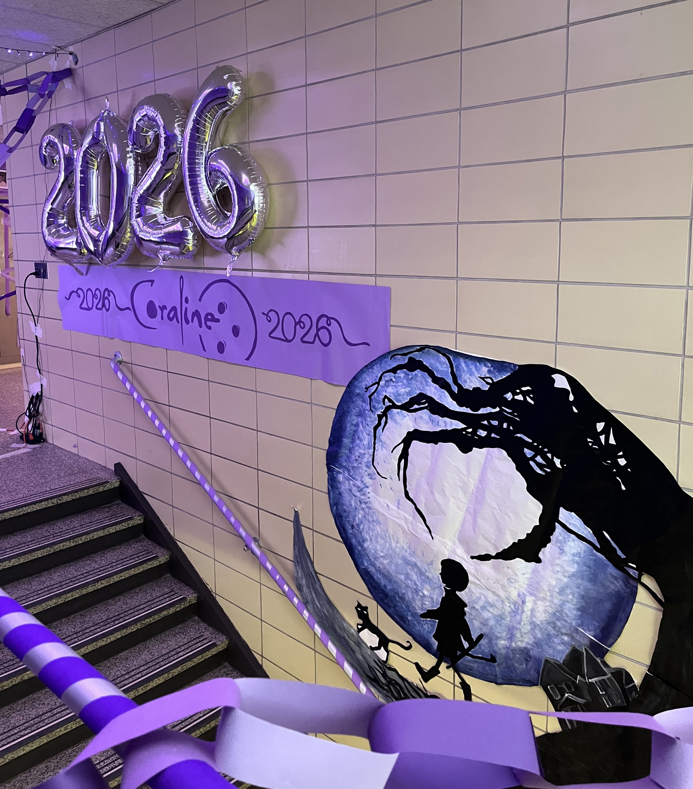 class of 2026-hallway-stairs A stairway is decorated in A Coraline theme