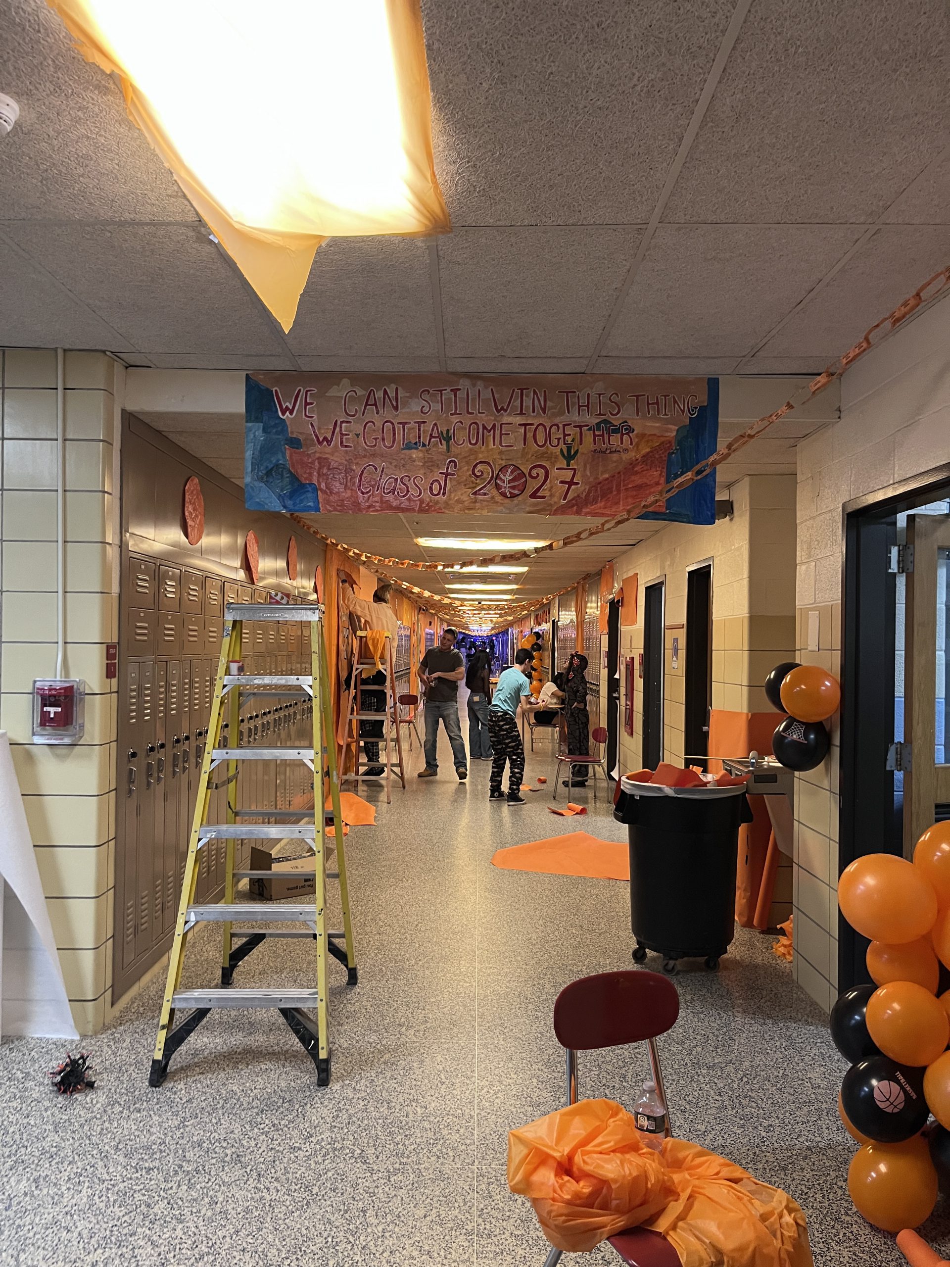 class of 2027-hallway-decorating Students decorate a hallway in a Space Jam theme