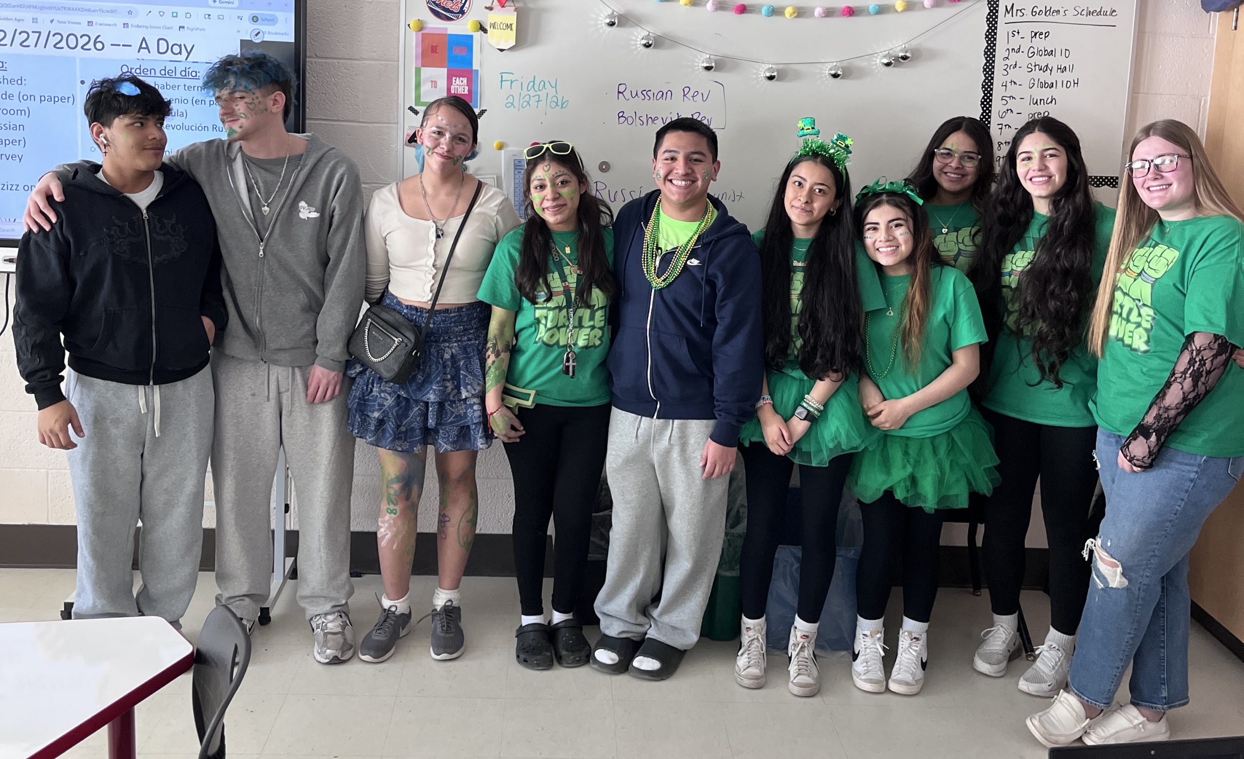 class of 2028-team Students dressed in green, some with Class of 2028 shirts, pose for a photo