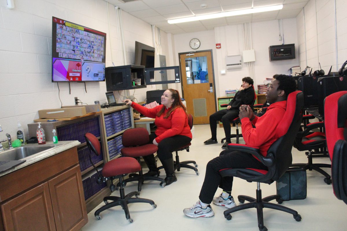 A coach sets up a player on Nintendo Switch to practice Smash Ultimate