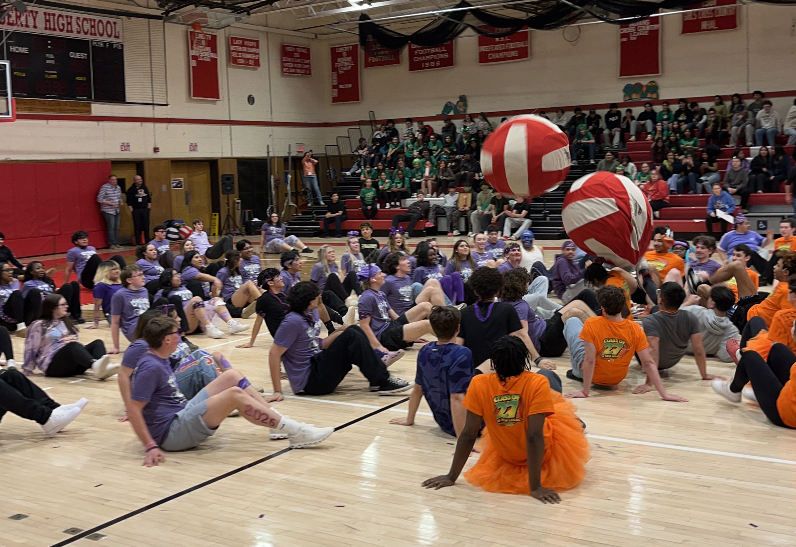 color wars- crab soccer classes of 2026 and 2027 Students in orange and blue play crab soccer