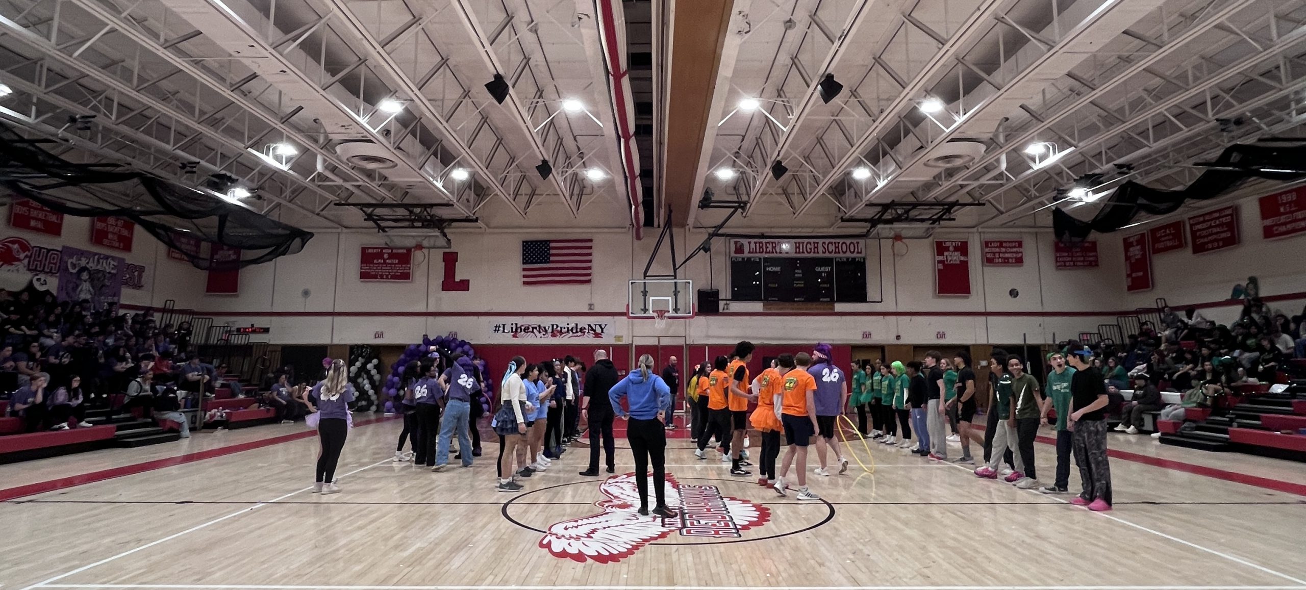 color wars-games Students line up in the gym to play a game