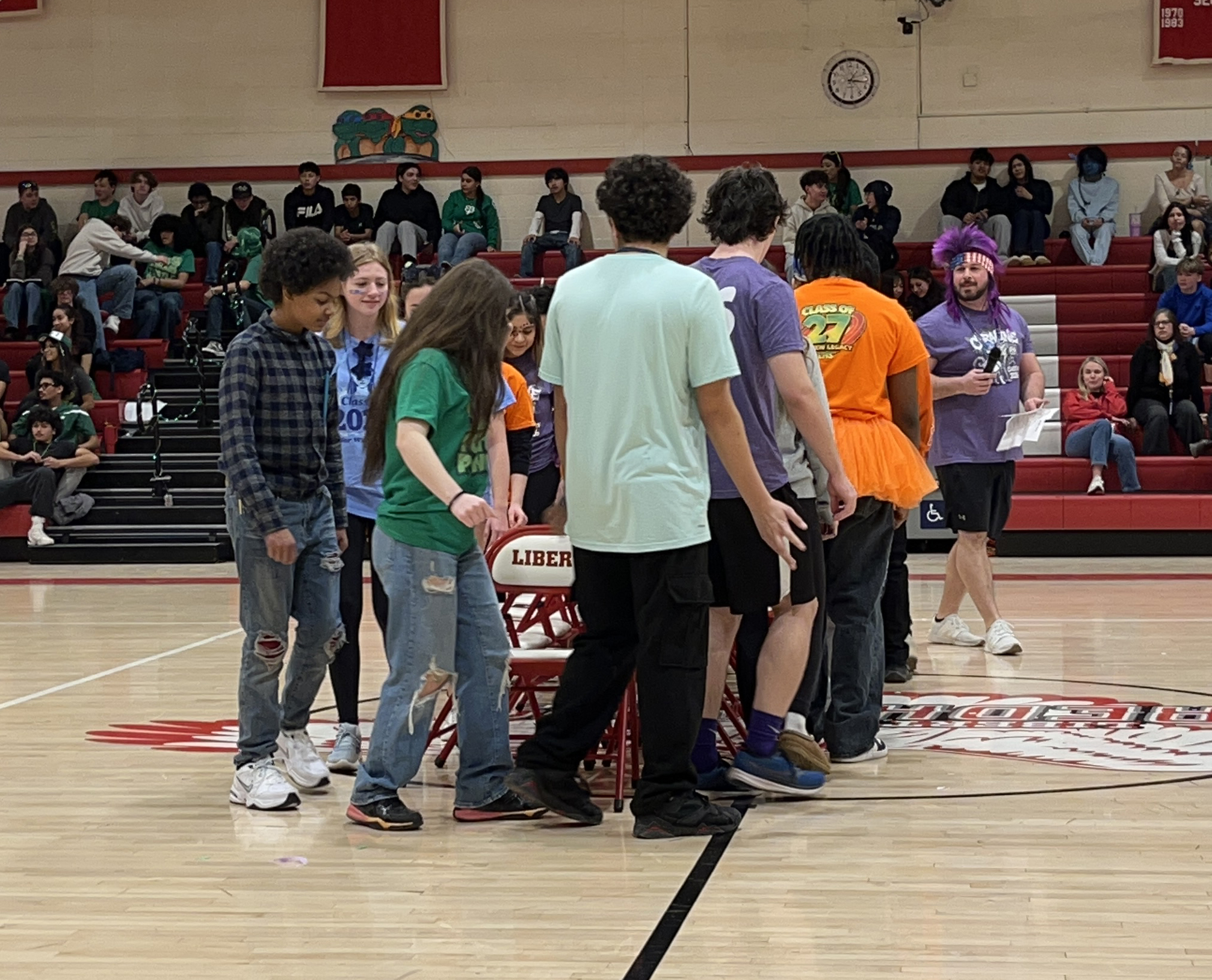 color wars-musical chairs Students play musical chairs in the gymnasium