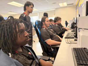 Students prepare to compete in an esports competition.