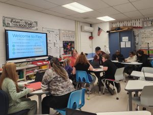 Students show their families their work during the student-led conferences at Liberty Middle School.