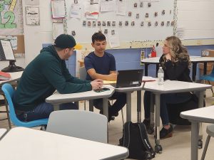 Students show their families their work during the student-led conferences at Liberty Middle School.