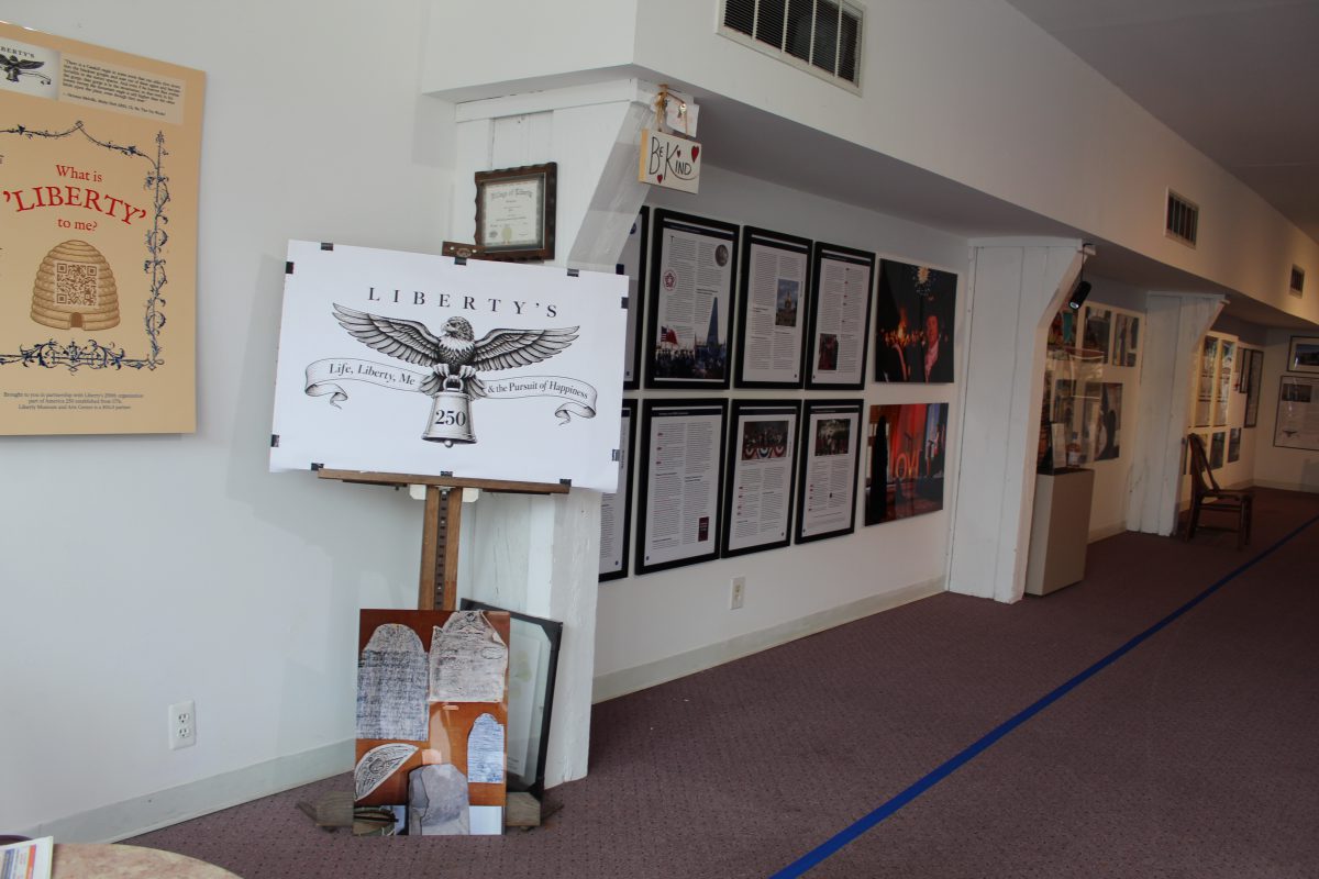 A sign for Liberty 250 welcomes people to the exhibit