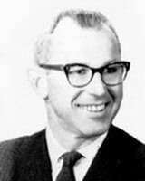 charles woody witherwax, portrait photo, black and white picture, wearing a tie and glasses, smiling, alumni of liberty and honoree of wall of fame